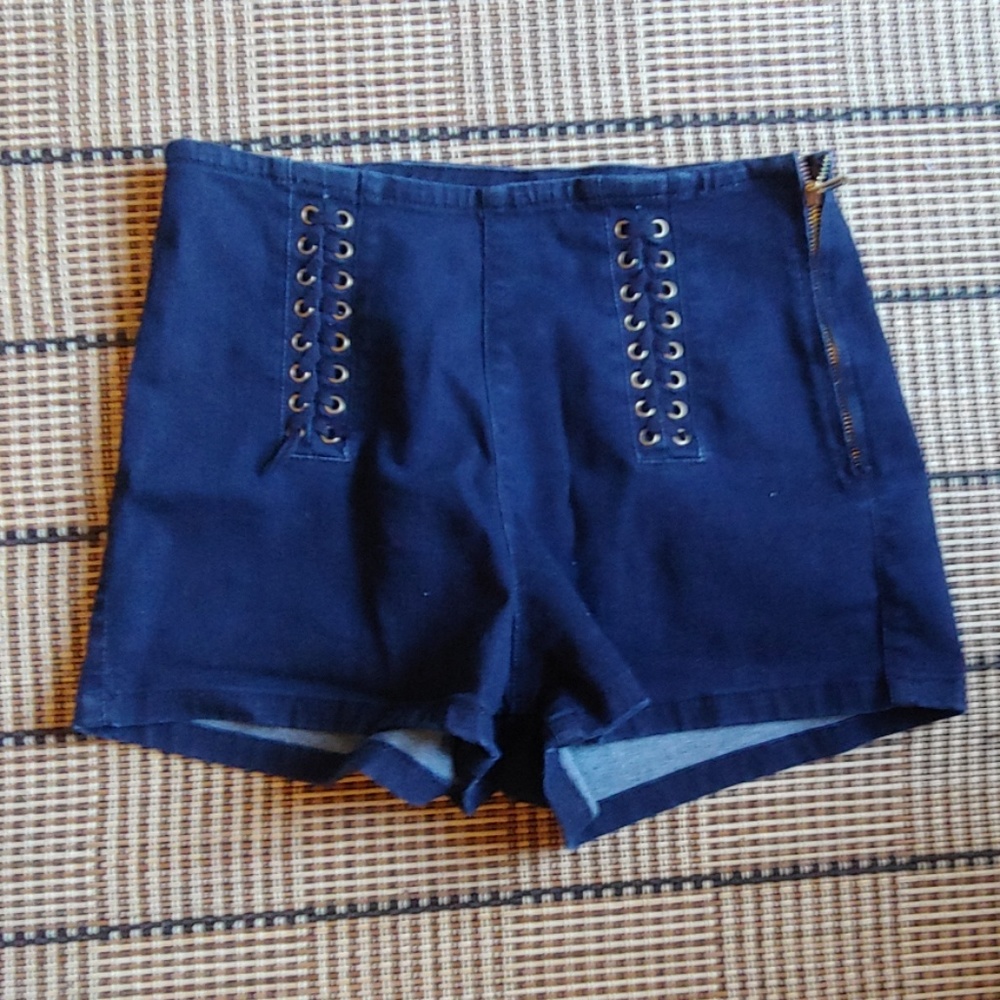 Blue shorts with zipper on side